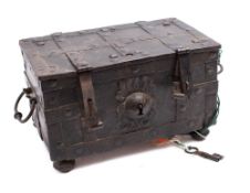 A 17th/18th wrought iron Nuremberg chest: the strap work top with hidden keyhole and double hasps
