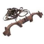 A 19th Century iron mounted wood yoke: with various leather straps, 122cm long.