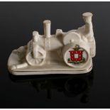 A rare WWI period crested ware model of a Tommy driving a steamroller over the Kaiser by Arcadian