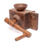 A 19th Century French fruitwood grain mill: with grinding handle and bowl surmount, 34cm long.