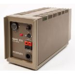 A Quad 34 Control Unit: serial number 022207, together with a Quad 303 Power Amplifier,