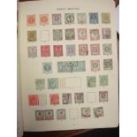 A collection of mainly used Great Britain stamps in twenty albums and loose with a used collection