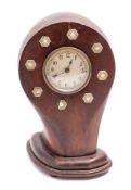 An early 20th century mahogany propeller boss mantel clock: the eight day movement with Arabic