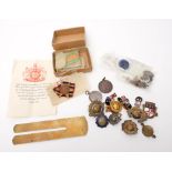A WWII group of four in original postage box: together with a brass button polisher and a