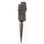 A WWI period German trench art shell shrapnel letter opener: of one piece construction,