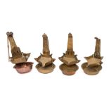 Four 18th Century brass Crusie lamps: with decorated uprights,