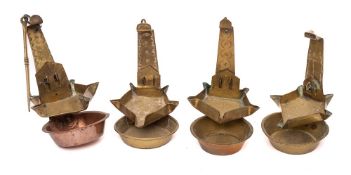 Four 18th Century brass Crusie lamps: with decorated uprights,