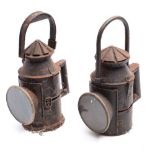Two early 20th century railway hand signal lanterns each with original burners and two colour