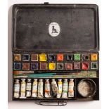 A Reeves black lacquer tin artist's paint box with label as per title under lid,