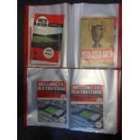 Two albums containing programmes for Manchester United,