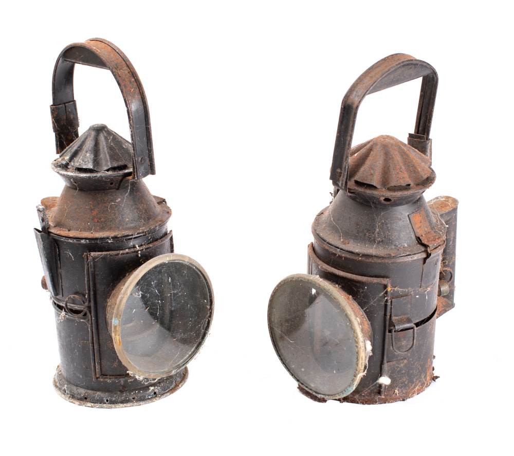 Two late 19th /early 20th century hand signal lamps with original burners and two colour shades;