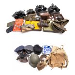 A collection of various militaria: including two German post war peaked caps, canvas webbing,