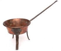 A 19th Century copper and iron mounted saucepan:, the long handle with hook terminal,