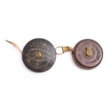 An early 20th century lawn tennis measure by Lunn & Co,