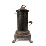 A 19th Century Continental clockwork spit engine: in cylindrical blackened metal casing surmounted