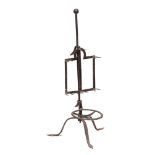 An early 19th Century iron bar-grate lark spit: with six twin prongs mounted on a central pole with