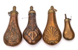 A copper and brass shot flask: by James Dixon & Sons, embossed with hanging game,
