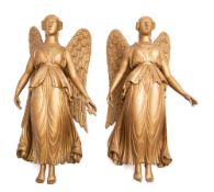 A pair of late 19th/early 20th century carved gilt wood figures of angels,