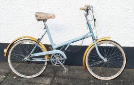 A Phillips bicycle together with a Universal folding bicycle and a Pony folding bicycle: (3)