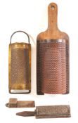 A metal food grater with wood mount:, 56cm high,