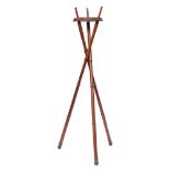A 19th Century simulated bamboo tripod folding kettle or pot stand: with circular platform,