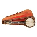 A 19th century five sting banjo by J E Dallas in an embossed brown simulated leather case.