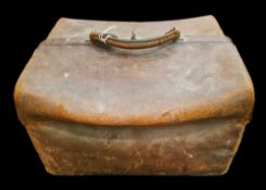 An Edwardian brown leather Gladstone style vanity case with green morocco leather interior with a