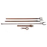 A wrought iron twin tine long handled toasting fork:, a twin tine fork with wood turned handle,