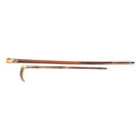 An Edwardian silver mounted antler handle riding crop,