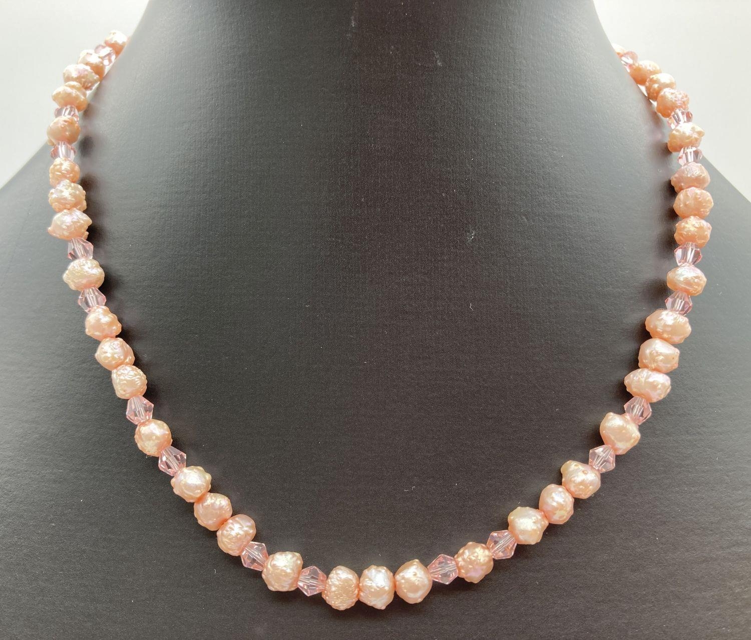 A 16" pink freshwater pearl and faceted glass bead necklace with magnetic barrel clasp. Retired