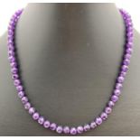 A 16" faceted amethyst beaded necklace with 9ct gold lobster claw clasp. Retired jewellery makers