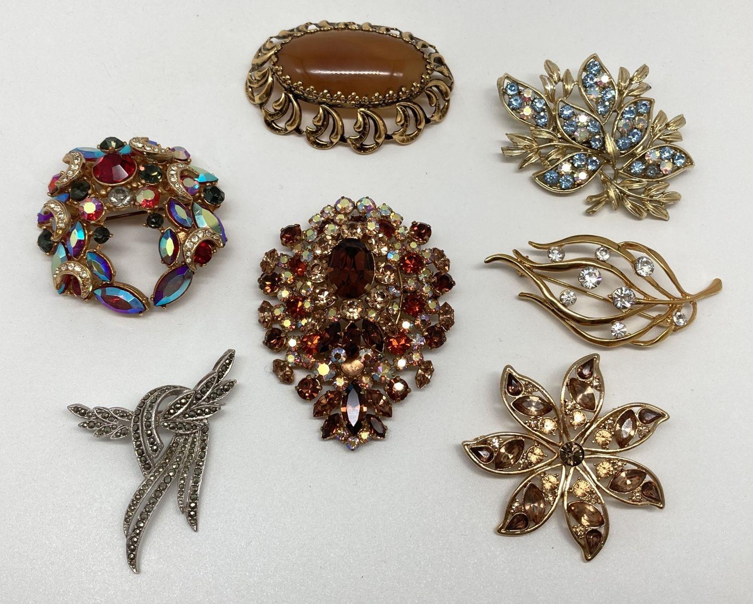 A collection of 7 vintage large statement brooches, all stone set. To include examples by Sphinx.