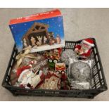 A box of Christmas decorations. To include light up hanging Christmas light spheres, a boxed