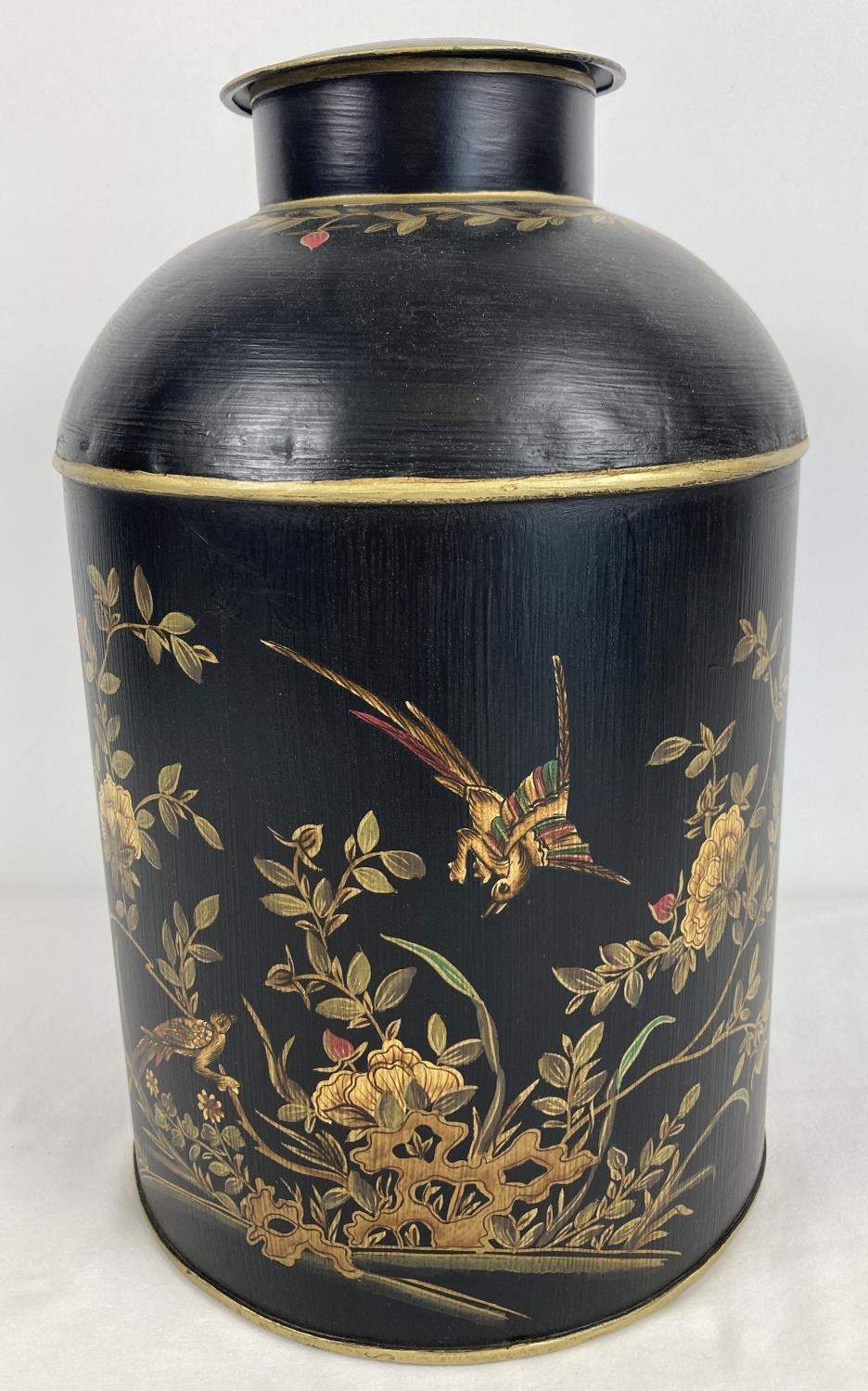 A large painted metal toleware lidded jar with hand painted flower & bird design. Lid and top rim