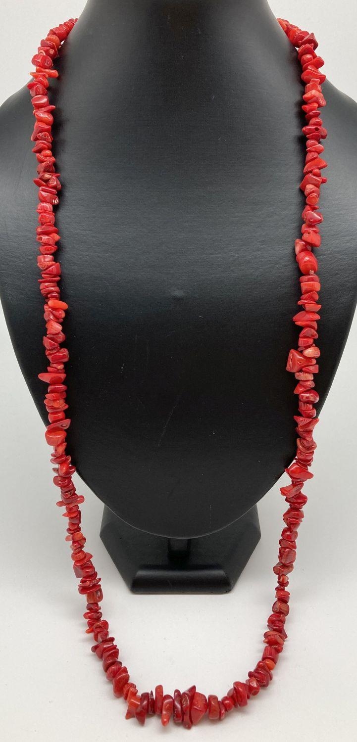 A 33" coral chip costume jewellery necklace. Retired jewellery makers stock.