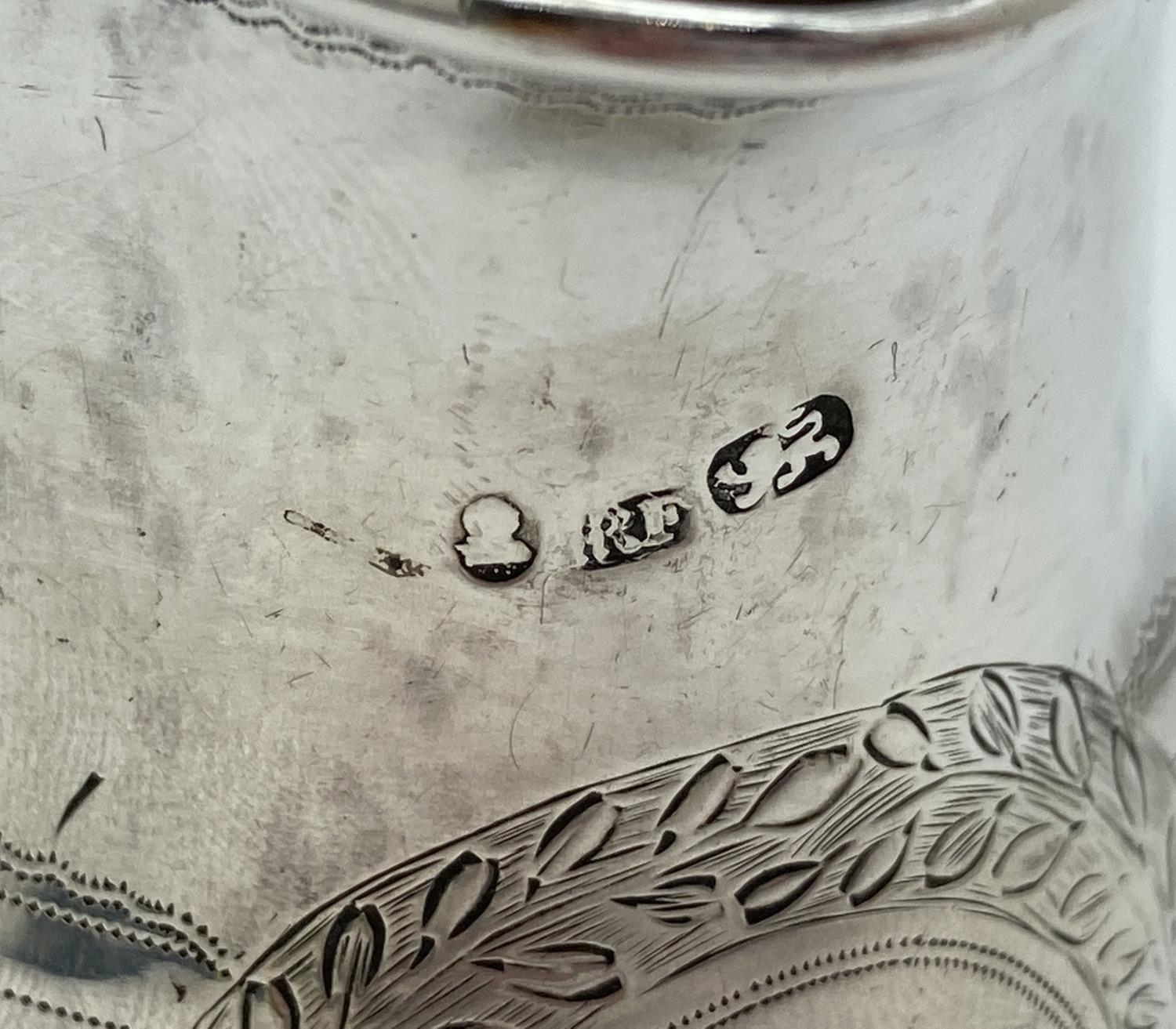 A Georgian silver cream jug with engraved floral banded design. Featuring a wreathed circular shaped - Image 3 of 4