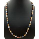 A 20" multicoloured lustre finish freshwater pearl necklace with gold tone magnetic clasp. Retired