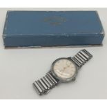 A mens vintage Rotary wristwatch with white face and secondary dial detail. Bonklip stainless