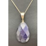 A Whitney Kelly teardrop shaped blue sandstone and silver pendant with faceted detail to front. On