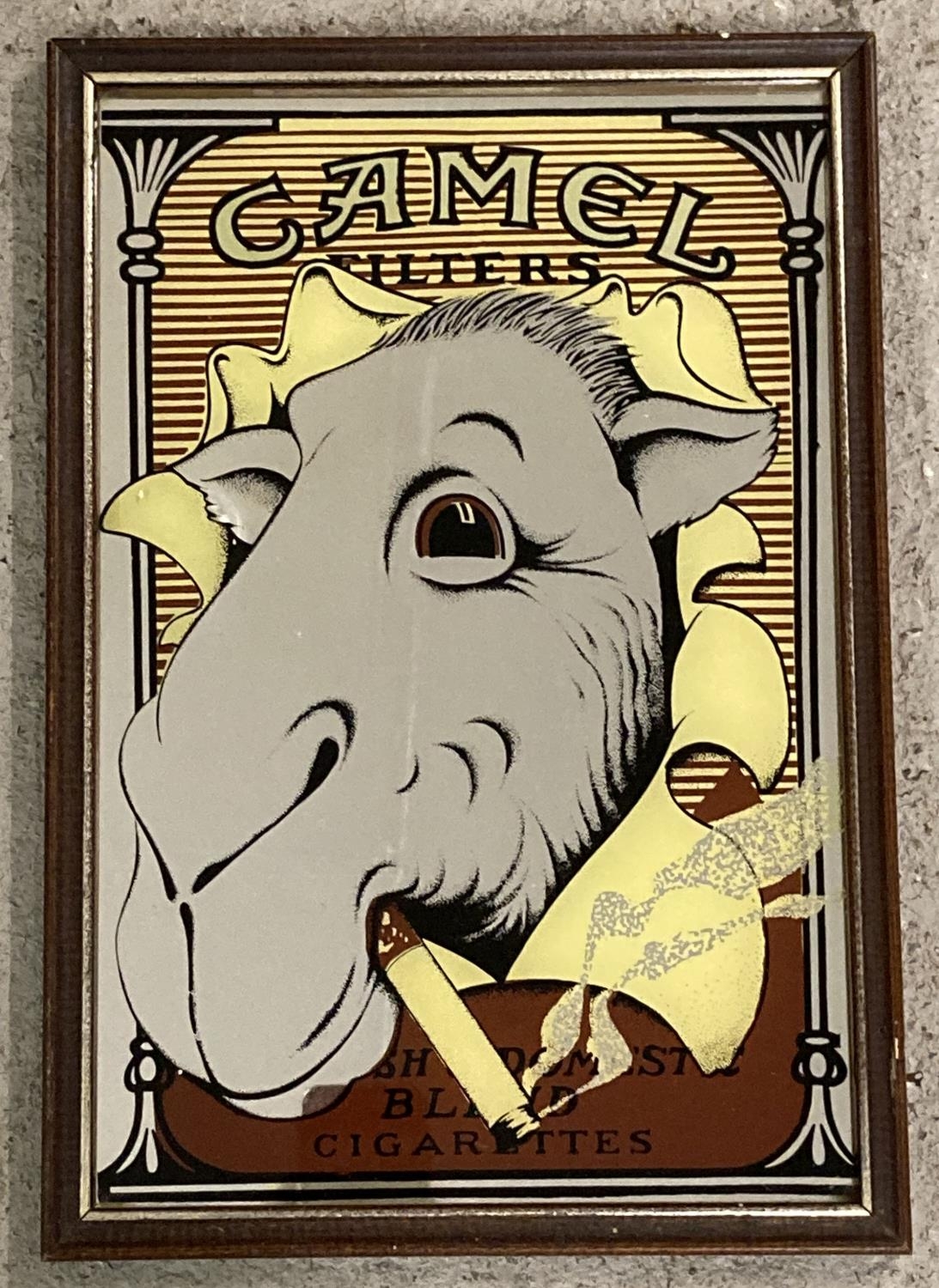 A small vintage advertising mirror for Camel Filters cigarettes, featuring Jo Camel. In dark wood