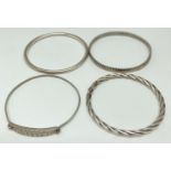 4 silver bangles and bracelets in varying sizes, styles and conditions. To include a Rennie