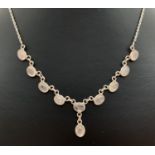A silver and rose quartz drop style necklace. Fine belcher style chain with hook and eye clasp and