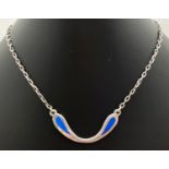 A contemporary design silver fixed pendant necklace with blue enamel detail and squared belcher