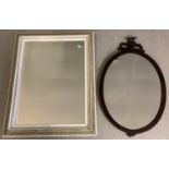 2 large vintage decorative wall hanging mirrors. A square shaped mirror with carved floral design to