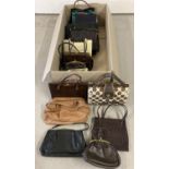 A collection of 20 assorted vintage kelly style handbags and shoulder bags. In varying colours,