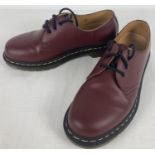 A pair of unboxed Dr Martens smooth Cherry red leather shoes, 1461, with yellow stitching. Size 5.