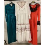 3 vintage 1970's full length, long sleeved maxi dresses. Comprising: Ceremonia, Shampers and