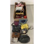 A large collection of assorted vintage and modern handbags. In varying styles, colours and