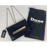 A new with tag, Dune Bastile black reptile clutch bag with gold coloured detailing. Complete with