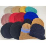A collection of 14 modern woollen hats and berets in various colours. To include: Monki, Weekday and